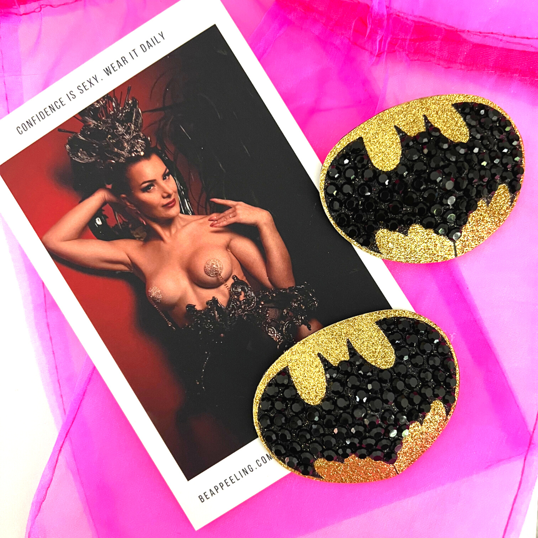 BAT SIGNAL Pasties de pezón de murciélago negro y ovalado dorado, cubiertas (2 piezas) para festivales Raves de lencería burlesca y Halloween